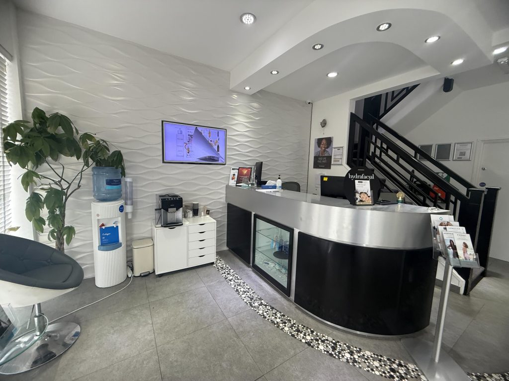skintique beautiful smiles front desk
