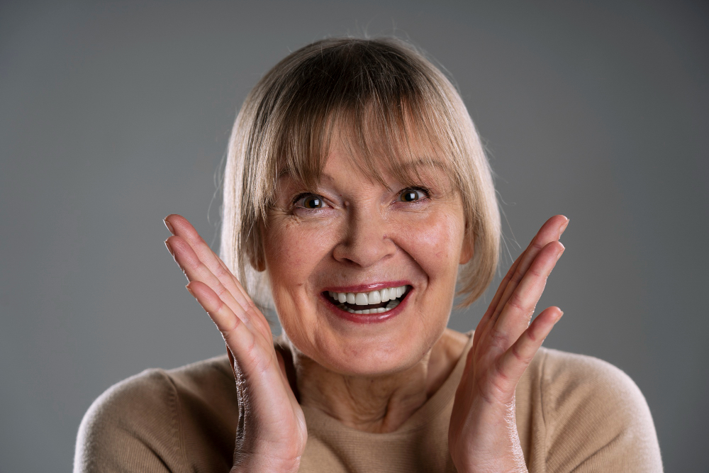 woman in mid 60s smiling